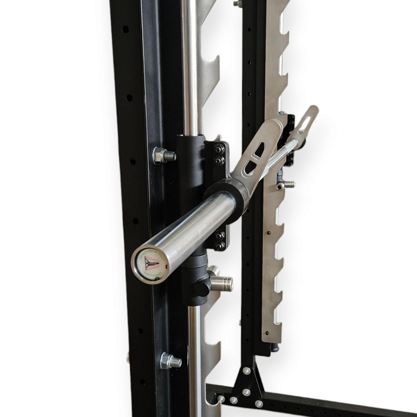 Dettaglio del sistema di scorrimento fluido e ganci di sicurezza del modulo Smith Machine Cozzo Strength.